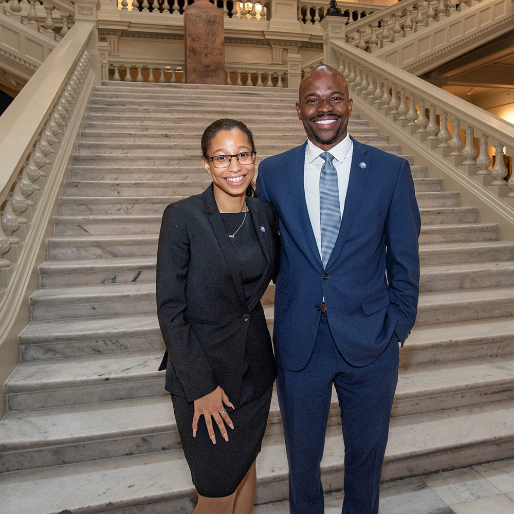 Atiyah Kennedy with GSU President Brian Blake